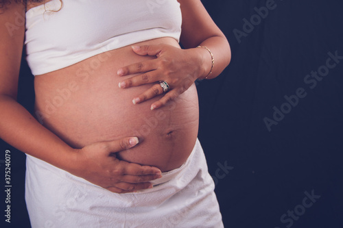 Pregnant woman Holding belly 