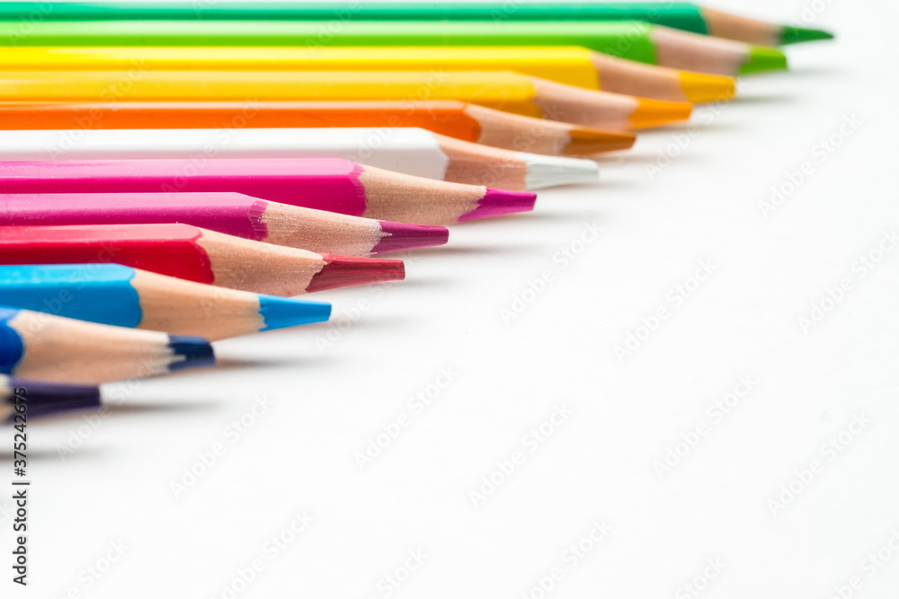 Close up of color pencils on white background Close up of color pencils on white background