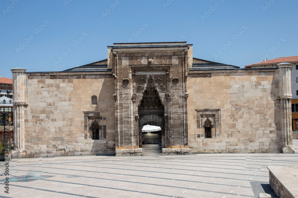 Sivas / Turkey - August 3, 2020: Sivas Buruciye Madrasah Seljuk era was built in 1271. The portal of the madrasa. The stone workmanship in the portal carries traces of Seljuk art.