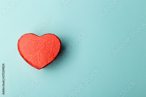 Red heart on blue background