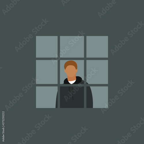 The man in the window behind bars