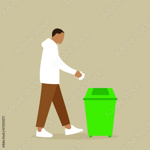 Male character throws crumpled paper into the bin