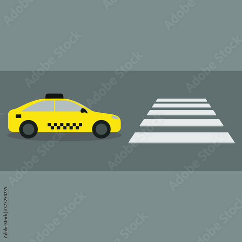 Taxis on the road before a pedestrian crossing