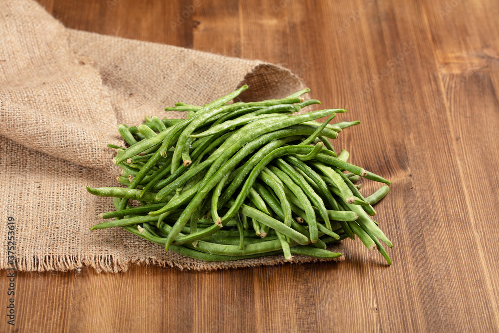 Green beans on wooden rustic table Green beans on wooden rustic table