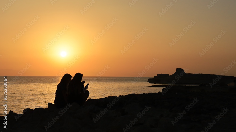 Sunrise over Xwejni Saltpans in Gozo (Island of Malta)