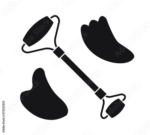 Vector set bundle of flat black stone face roller and gua sha isolated on white background