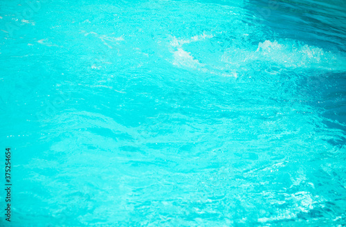 surface of blue swimming pool,background of water in swimming pool. 