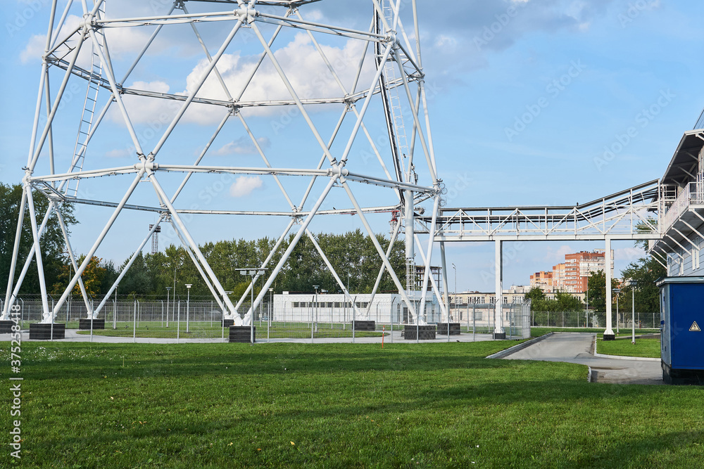 Fototapeta premium the base of a huge lattice television tower