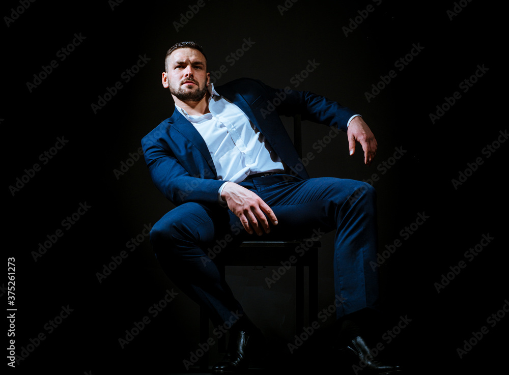 Modern businessman. Confident young man in suit isolated on black. Modern businessman. Confident young man in suit isolated on black.