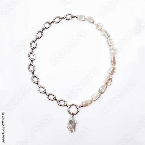 Luxury elegant baroque pearl necklace on white background