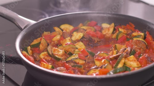 Preparation of homemade dinner -  hungarian meal -  Letcho. photo