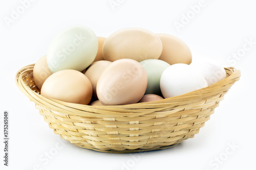 Wallpaper Mural typical caipira egg from brazil on isolated white background in straw basket Torontodigital.ca