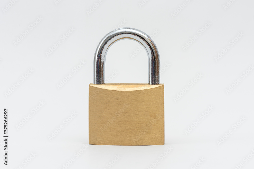 Locked Golden Padlock on the gray background. Locked Golden Padlock on the gray background.