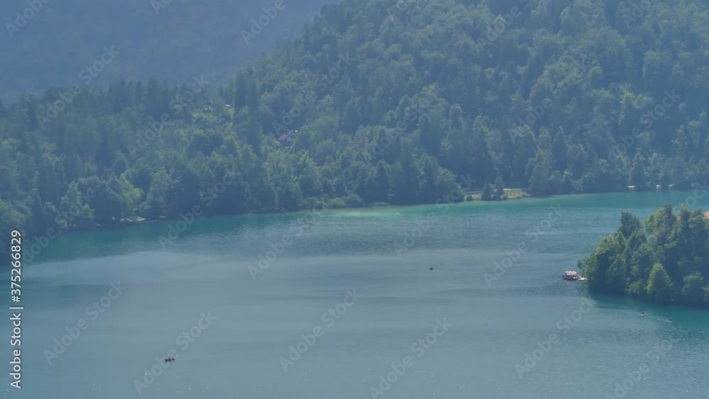 Lake in Bled. Beautiful chapel on the island in the middle of mountain lake, Slovenia. Lake in Bled. Beautiful chapel on the island in the middle of mountain lake, Slovenia.
