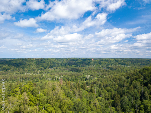 Turaida castle in between the forest. Aerial photo.