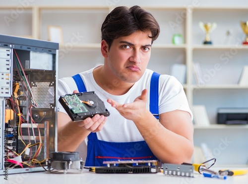 Wallpaper Mural Computer repairman repairing desktop computer Torontodigital.ca