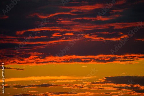 Beautiful sunset sky and clouds. Dramatic orange, red sky.  © Lab_Photo