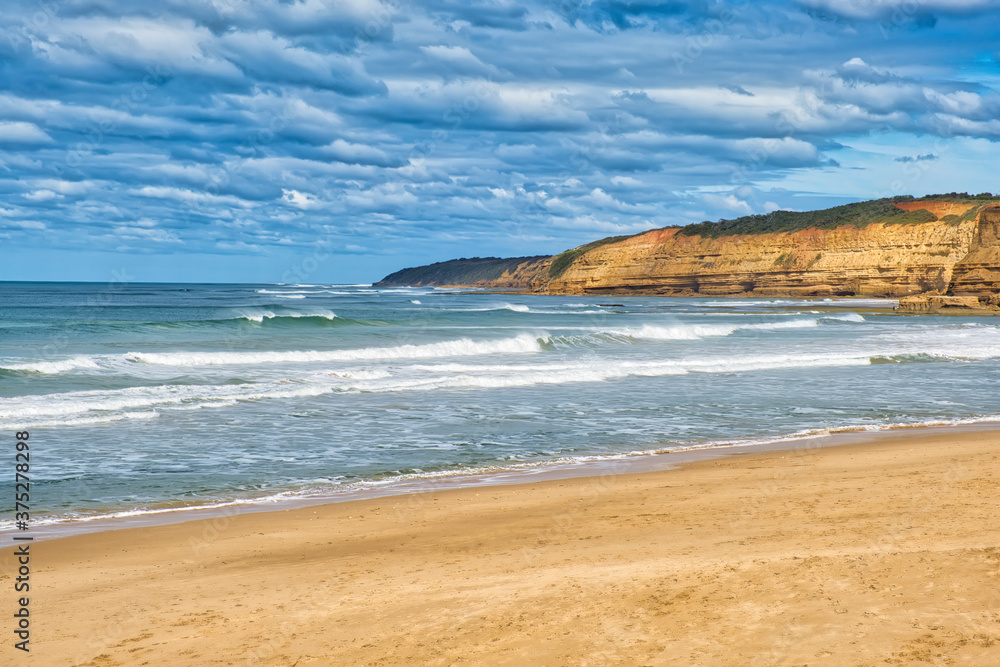 Incoming waves and limestone coastline at Jan Juc beach, Jan Juc, near Torquay, Surf Coast Shire, Great Ocean Road, Victoria, Australia Incoming waves and limestone coastline at Jan Juc beach, Jan Juc, near Torquay, Surf Coast Shire, Great Ocean Road, Victoria, Australia