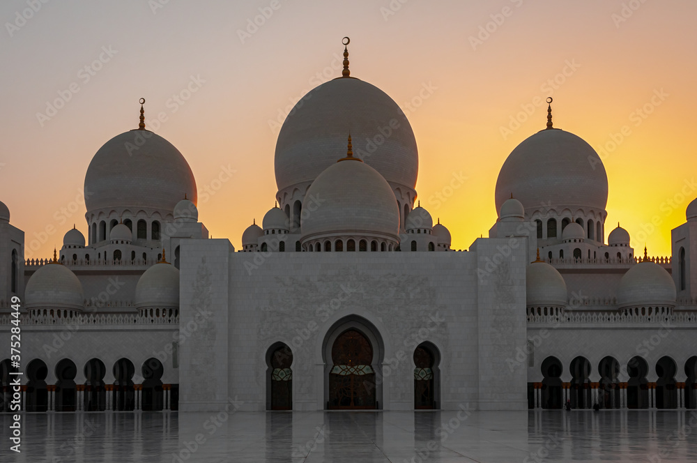 Sunset view of The Sheikh Zayed Mosque in Abu Dhabi