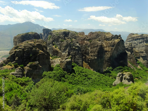 Unique rock formations in the field of Meteora, Greece. Meteora is an UNESCO heritage site for monastery buildings and famous tourist attractions.