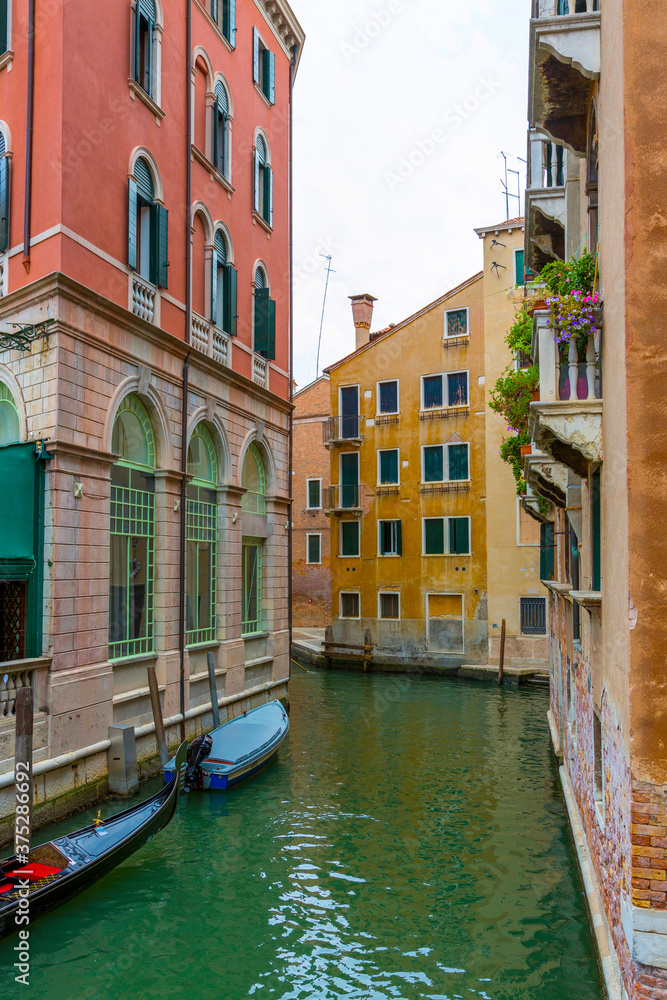 Walk along the streets and canals of Venice