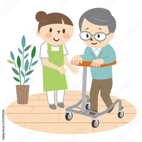 歩行器でリハビリ訓練をするシニア男性