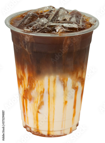 Realistic plastic cup on white background. Isolated Mock up Cold beaverage di cut with cliping path. Template block with blank space. Iced fresh melt caramel cacchiato with fresh milk.