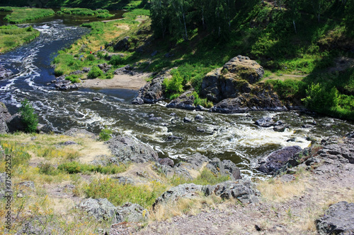 Fototapeta Naklejka Na Ścianę i Meble -  Large boulders in a mountain river