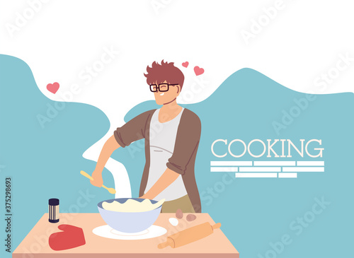 young man in love cook preparing a cake