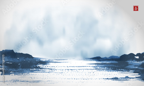 Blue landscape with lake view and cloudy sky in asian style hand drawn with sumi ink. Traditional oriental ink painting sumi-e, u-sin, go-hua. Translation of hieroglyph - joy