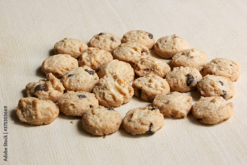 Mini Chocolate chip cookies , On wood Background Mini Chocolate chip cookies , On wood Background