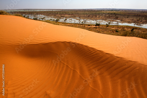 Red sand dune in Simpson Desert, near Birdsville outback Queensland Australia photo