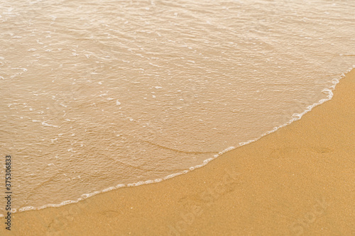 waves on the sand