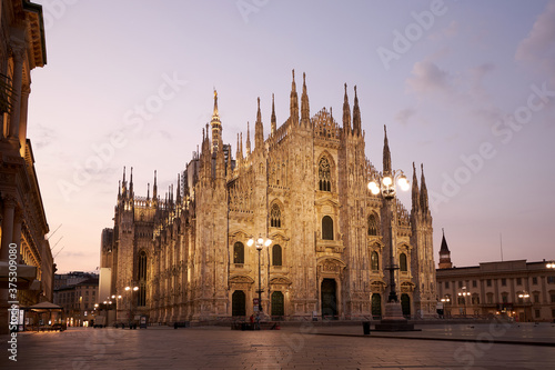View of the beautiful high Duomo at night. Against the background of a beautiful sunset. Milan, Italy. 22.08.2020