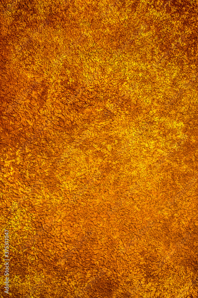 Background wall with abstract spots. Beautiful golden texture with stains, abstract surface background, modern bright painting of walls in trending shades, unusual spotty silver and gold surface. Background wall with abstract spots. Beautiful golden texture with stains, abstract surface background, modern bright painting of walls in trending shades, unusual spotty silver and gold surface.