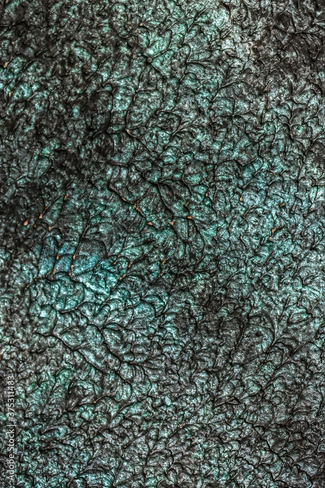 Obraz premium Beautiful dark green texture abstract wall background, ribbed surface texture with copy space, unusual mottled brown surface background