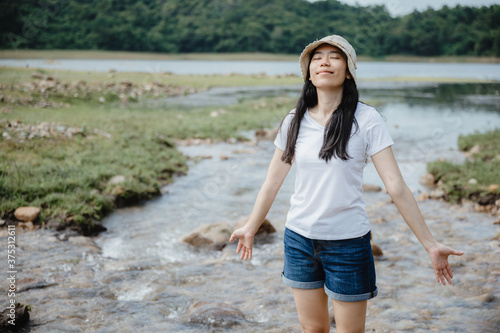 Asian young woman having en...