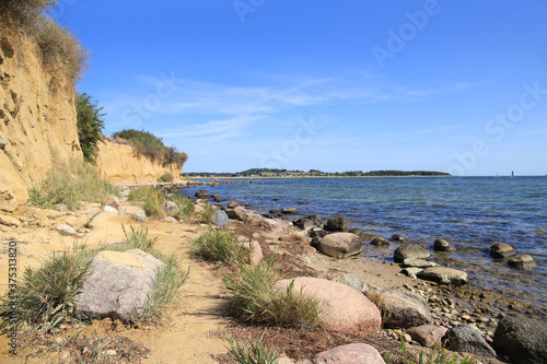 A path along the steep coast of the holiday destination "Klein Zicker" at the island Rügen, Baltic Sea - Germany
