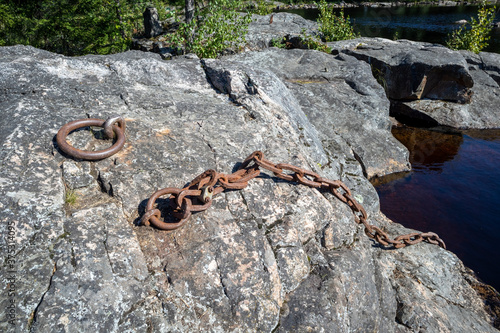 rusted chain and ring used for mooring or anchoring