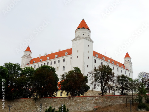 Bratislava Castle in Bratislava, Slovakia. Bratislava Castle with four corner towers stands on an isolated rocky hill of the Little Carpathians.