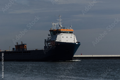 MERCHANT VESSEL - Freighter entering the port