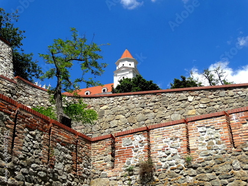 Bratislava Castle in Bratislava, Slovakia. Bratislava Castle with four corner towers stands on an isolated rocky hill of the Little Carpathians.