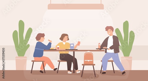 Adolescent children spend time together during school break talking and eating in canteen. Schoolchild sitting at table. Pupil holding tray with lunch. Flat vector cartoon illustration