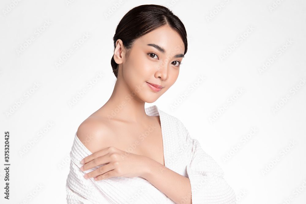 Beautiful Young asian Woman with Clean Fresh Skin, on white background, Face care, Facial treatment, Cosmetology, beauty and spa, Asian women portrait Beautiful Young asian Woman with Clean Fresh Skin, on white background, Face care, Facial treatment, Cosmetology, beauty and spa, Asian women portrait