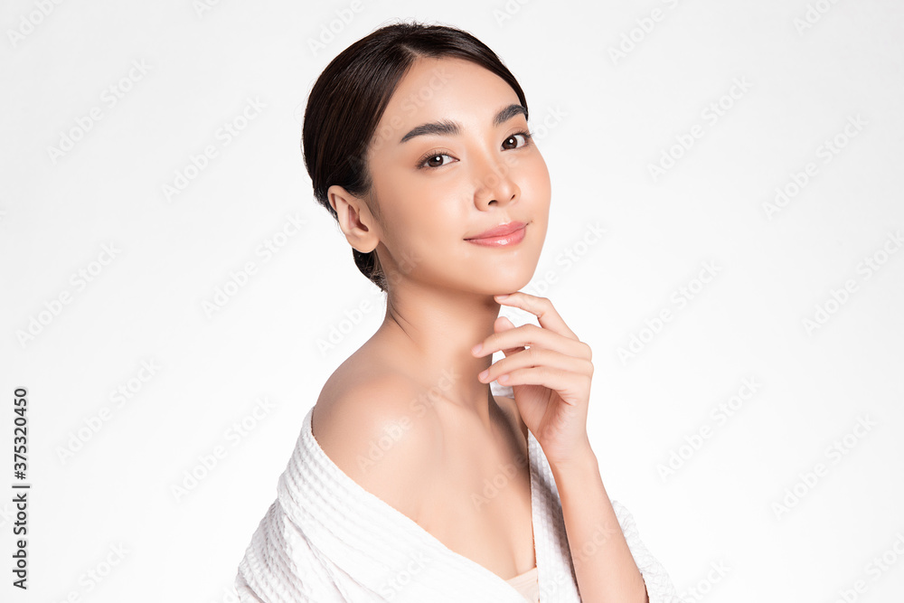 Beautiful Young asian Woman with Clean Fresh Skin, on white background, Face care, Facial treatment, Cosmetology, beauty and spa, Asian women portrait Beautiful Young asian Woman with Clean Fresh Skin, on white background, Face care, Facial treatment, Cosmetology, beauty and spa, Asian women portrait