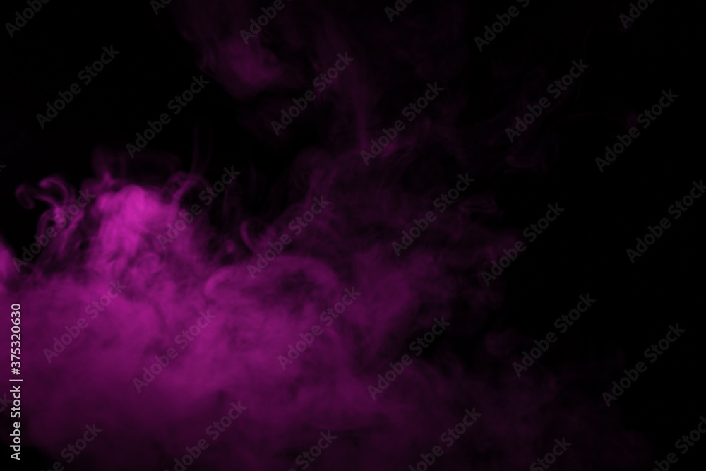 Colorful smoke close-up on a black background. Blurred pink cloud of smoke. Colorful smoke close-up on a black background. Blurred pink cloud of smoke.