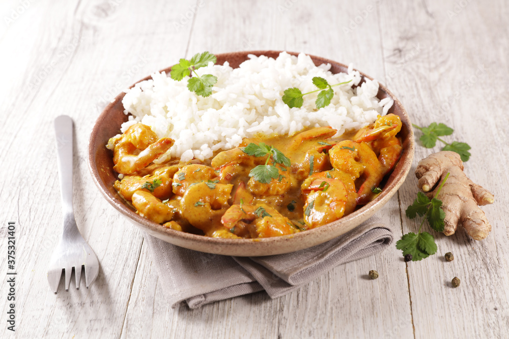 shrimp cooked with curry sauce and rice shrimp cooked with curry sauce and rice