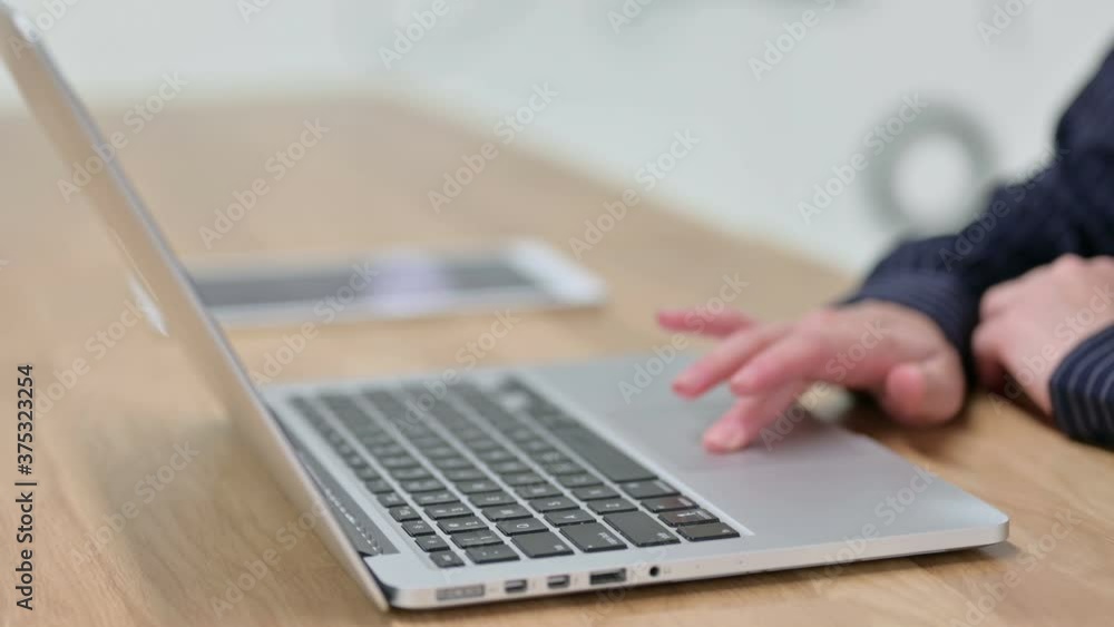 Female Hand Scrolling Touchpad of Laptop Female Hand Scrolling Touchpad of Laptop