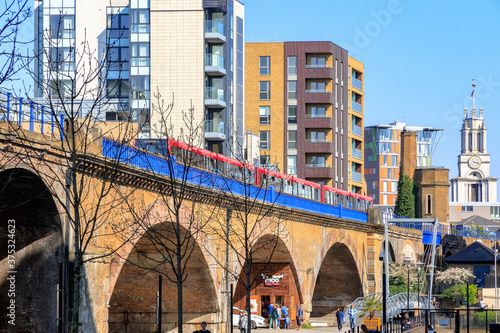 Canvas Print Limehouse viaduct carrying Docklands Light Railway system in London