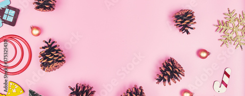Banner christmas frame made of decorations on a pink background isolate, copy space, layout